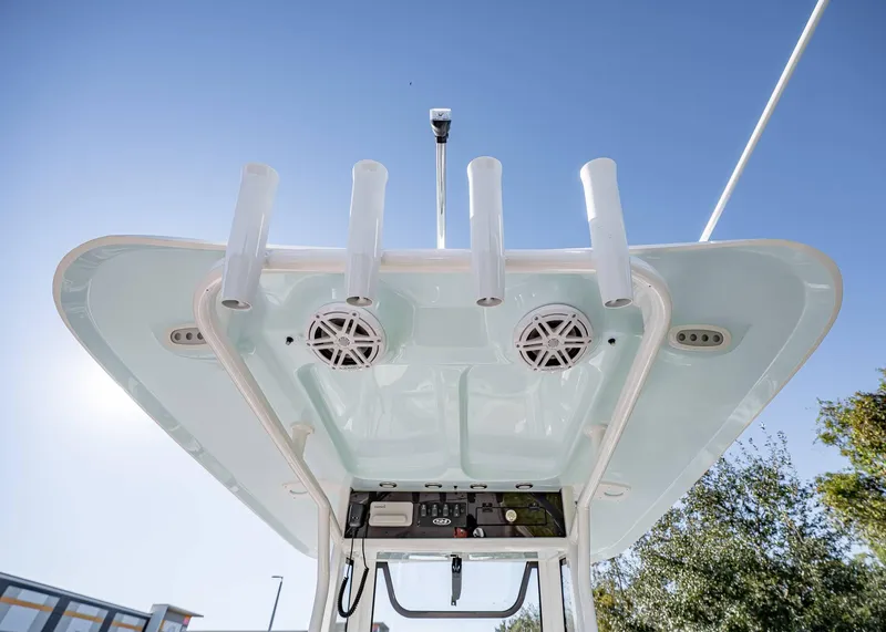 Slide: The Image of 2025 Sea Hunt Ultra 239 SE boat top view with rod holders and speakers. - 16