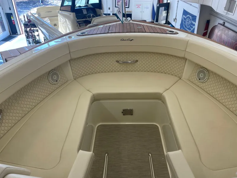 Slide: The Image of 2024 Chris-Craft Calypso 32 boat interior with luxurious seating and elegant design. - 32