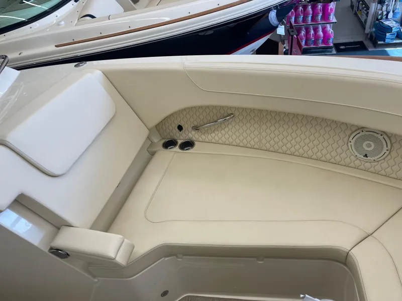 Slide: The Image of 2024 Chris-Craft Calypso 32 boat interior with beige seating and elegant design. - 33