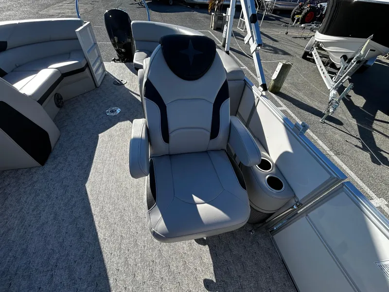 Slide: The Image of 2024 Berkshire 22RFX LE 2.75 boat interior with plush seating and cup holders. - 13