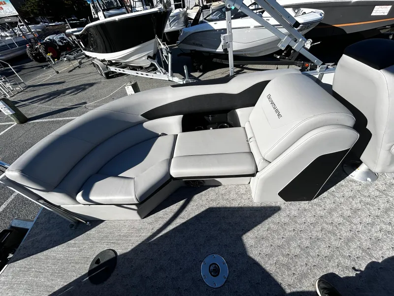 Slide: The Image of 2024 Berkshire 22RFX LE 2.75 boat interior with gray seating and modern design. - 14