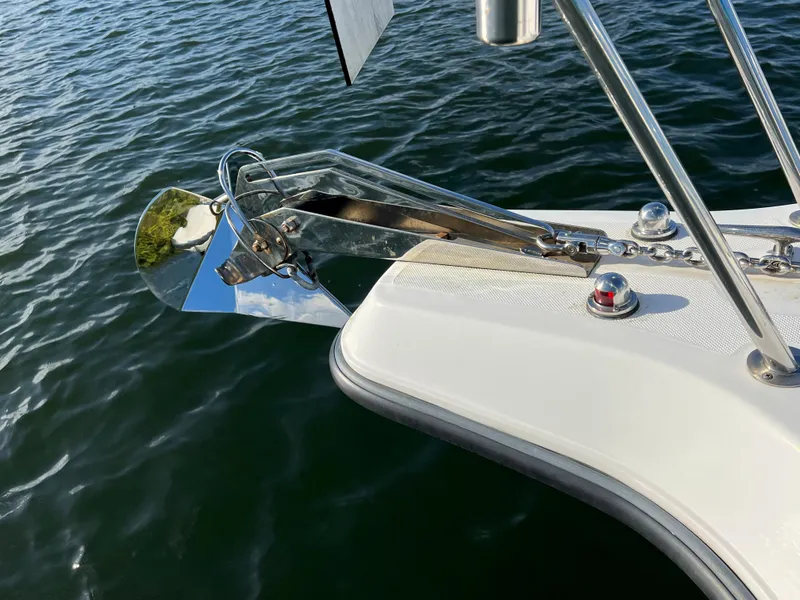 Slide: The Image of Century 3200 Walk-Around 2005 boat anchor detail over water. - 15