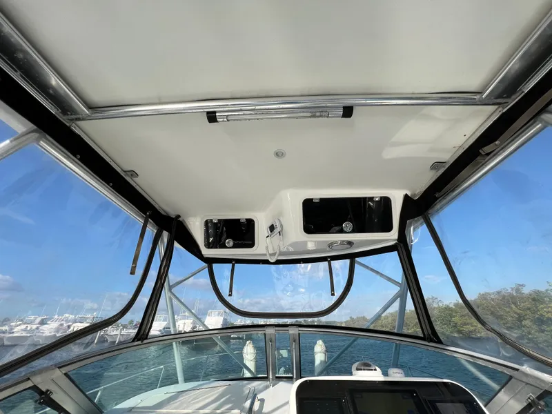 Slide: The Image of Interior view of 2005 Century 3200 Walk-Around boat with clear skies. - 25