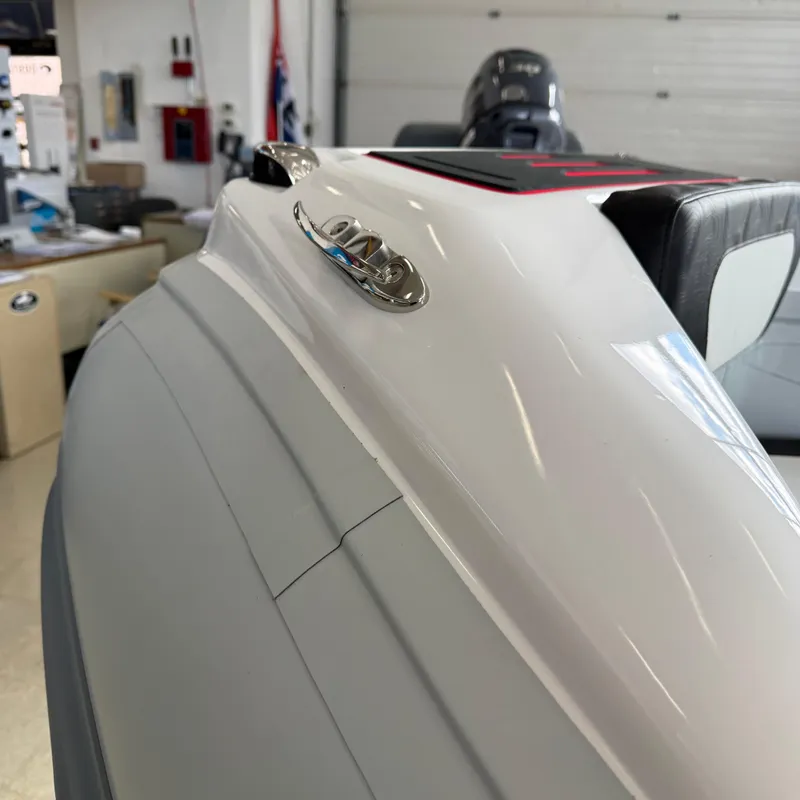 Slide: The Image of 2025 Highfield 420 Velox boat detail in showroom, showcasing sleek design and modern features. - 19