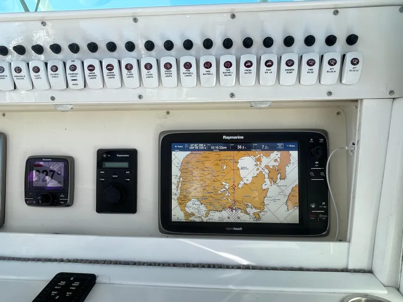 Slide: The Image of Boat dashboard with navigation system and control panel, Everglades 350CC, 2008 model. - 12
