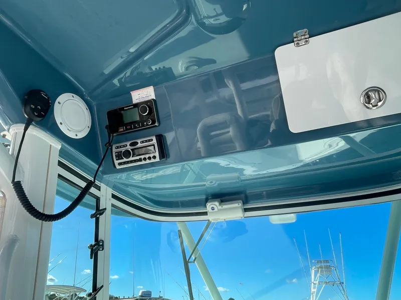Slide: The Image of Interior view of 2008 Everglades 350CC boat with radio and control panel. - 7