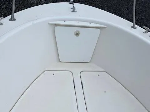 Slide: The Image of 1998 Bayliner Trophy 1903 CC boat deck with storage compartments. - 7