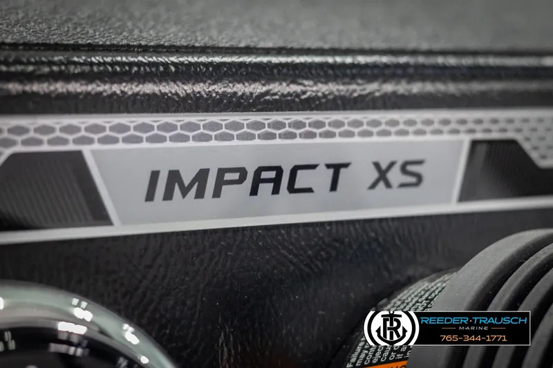 Slide: The Image of Close-up of 2025 Lund 1875 Impact XS boat dashboard with logo. - 30
