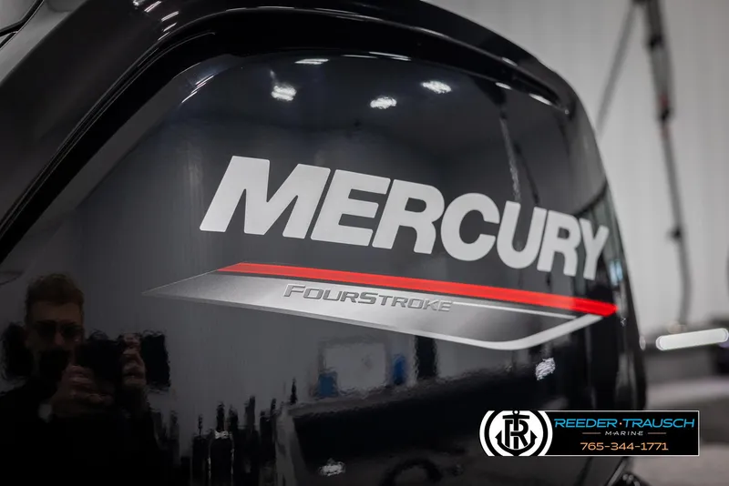 Slide: The Image of Mercury FourStroke engine on 2025 Lund 1875 Impact XS boat, Reeder-Trausch Marine branding. - 40