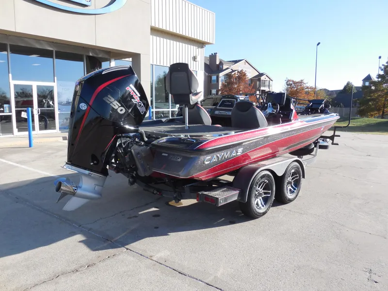 Slide: The Image of 2021 Caymas CX 20 PRO boat with powerful engine, parked outdoors. - 3