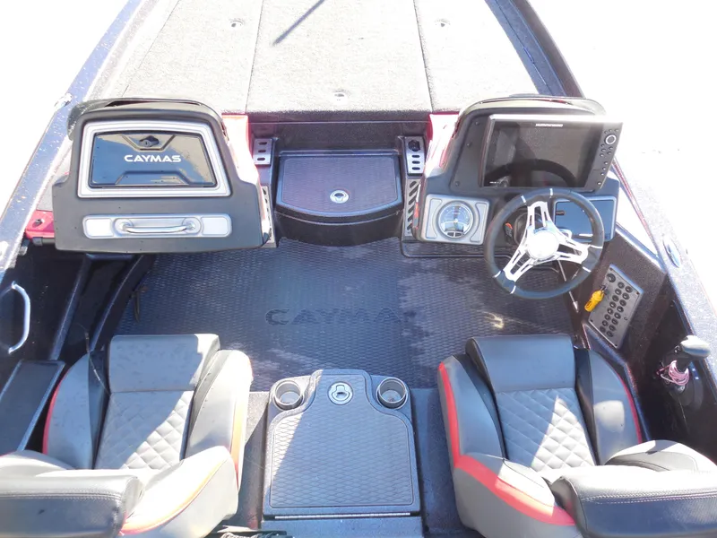Slide: The Image of 2021 Caymas CX 20 PRO boat interior with dual consoles and seating. - 6