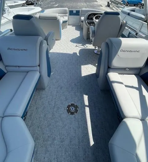 Slide: The Image of 2025 Berkshire 22 RFX LE Tri-toon Pontoon with spacious seating and modern interior design. - 10