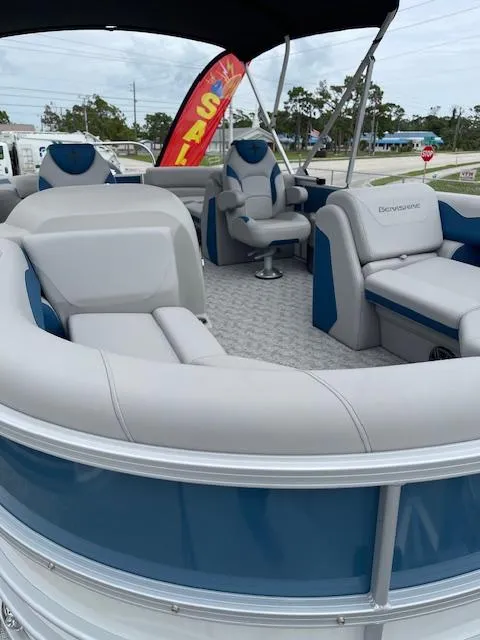 Slide: The Image of 2025 Berkshire 22 RFX LE Tri-toon Pontoon with spacious seating and modern design. - 14