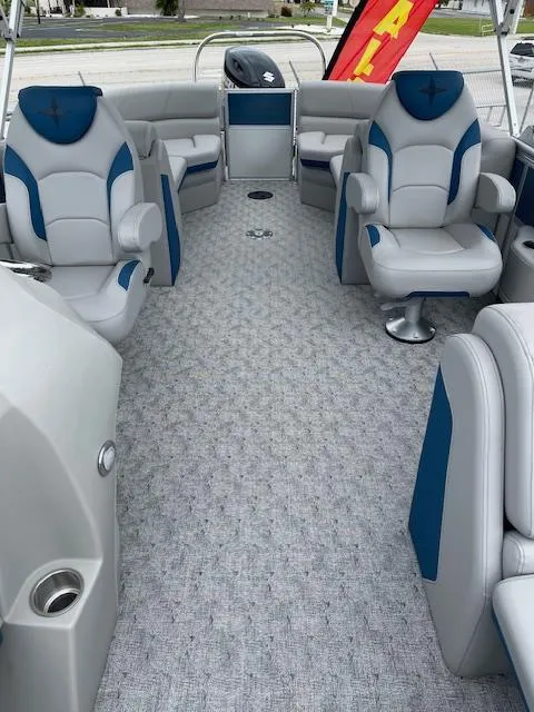 Slide: The Image of 2025 Berkshire 22 RFX LE Tri-toon Pontoon interior with plush seating and modern design. - 15