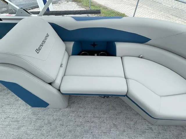 Slide: The Image of 2025 Berkshire 22 RFX LE Tri-toon Pontoon with luxurious seating and modern design. - 19