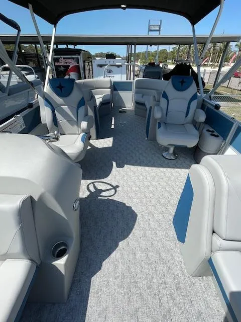 Slide: The Image of 2025 Berkshire 22 RFX LE Tri-toon Pontoon interior with spacious seating and modern design. - 8