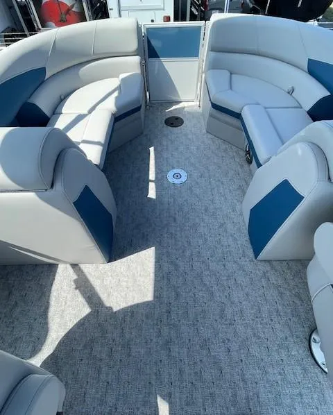 Slide: The Image of 2025 Berkshire 22 RFX LE Tri-toon Pontoon interior with plush seating and modern design. - 9