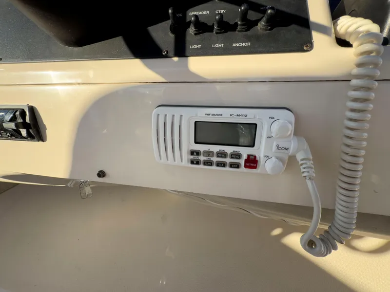 Slide: The Image of VHF marine radio on 2005 Mainship 34 Trawler dashboard. - 50