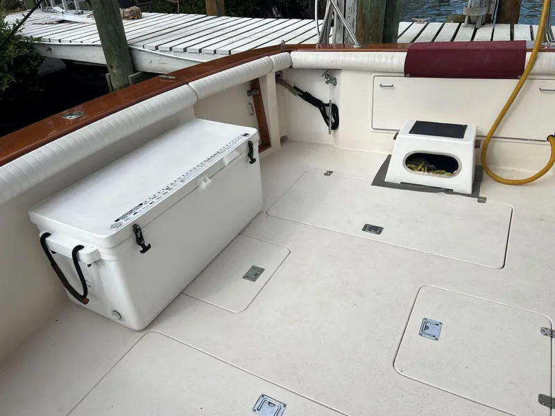 Slide: The Image of 1988 Ocean Yachts 38 Super Sport deck with storage and seating area. - 28