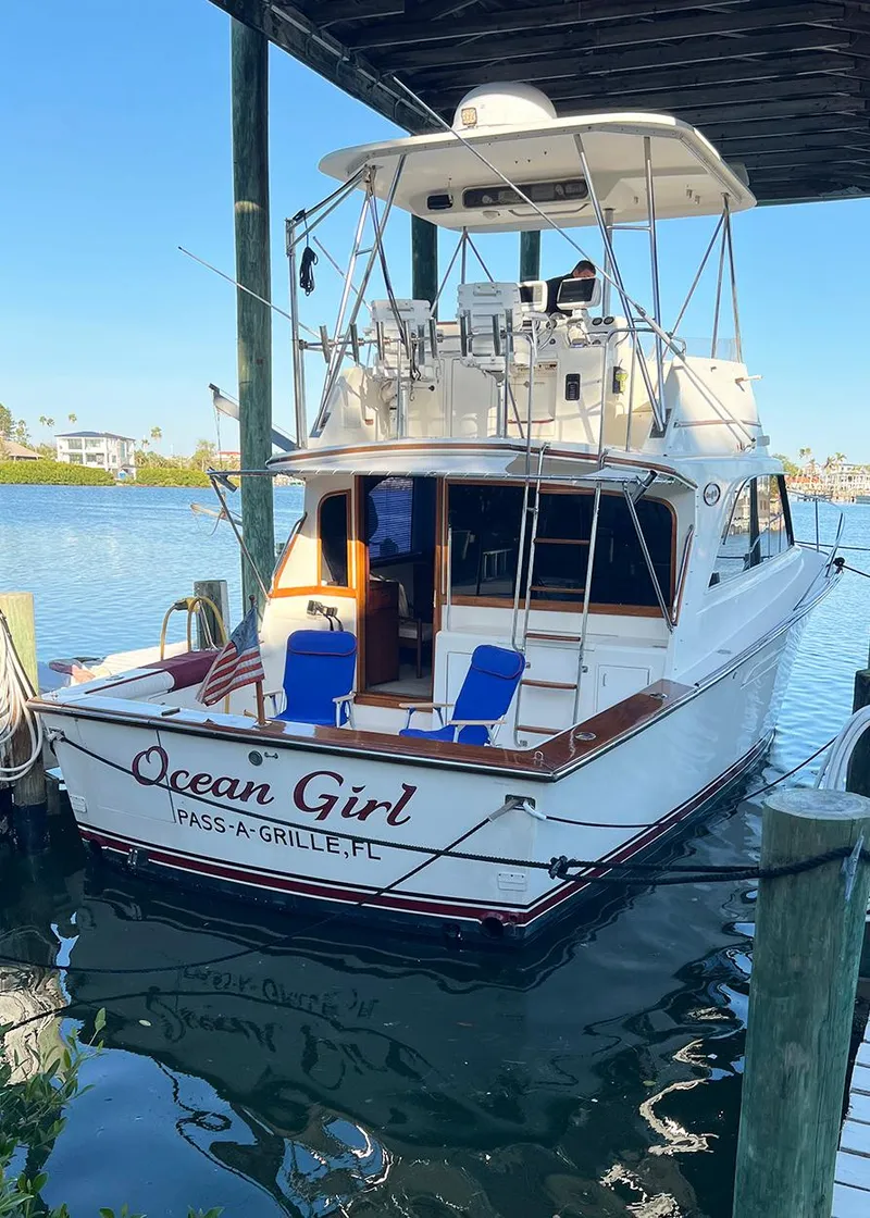 Slide: The Image of 1988 Ocean Yachts 38 Super Sport docked, named "Ocean Girl," Pass-A-Grille, FL. - 3