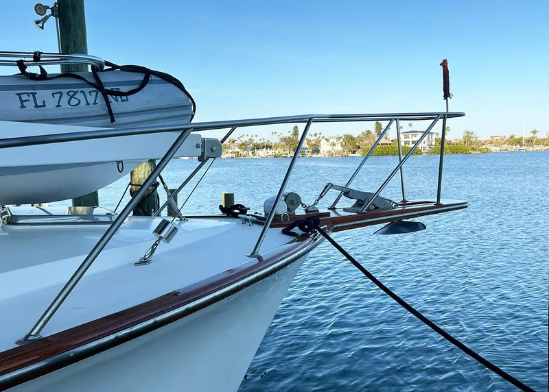 Slide: The Image of 1988 Ocean Yachts 38 Super Sport docked on calm water. - 7