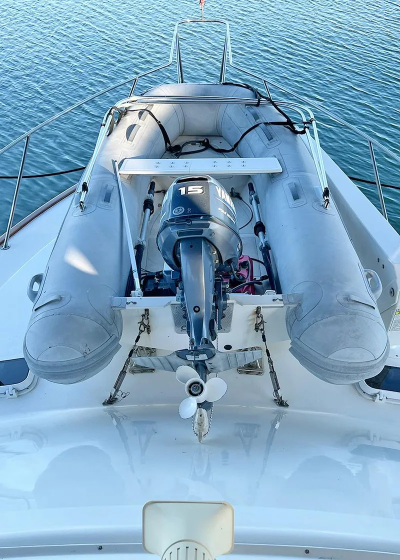 Slide: The Image of 1988 Ocean Yachts 38 Super Sport with inflatable dinghy on deck. - 8