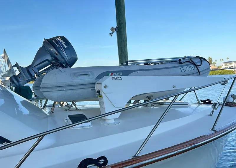 Slide: The Image of 1988 Ocean Yachts 38 Super Sport with Yamaha motor and inflatable boat on deck. - 9