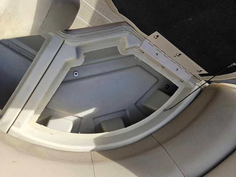 Slide: The Image of 2019 Manitou 22 Aurora LE 220VP Tritoon Pontoon seat storage compartment. - 15