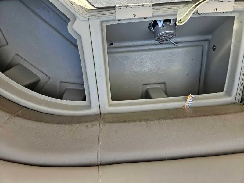 Slide: The Image of 2019 Manitou 22 Aurora LE 220VP Tritoon Pontoon storage compartment interior. - 17