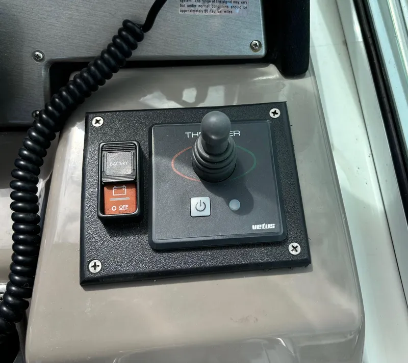 Slide: The Image of Joystick control panel on 2011 Cruisers Yachts 330 Express. - 16