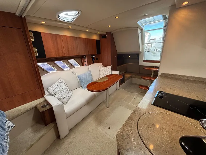 Slide: The Image of Luxurious interior of 2011 Cruisers Yachts 330 Express with modern amenities and elegant design. - 20