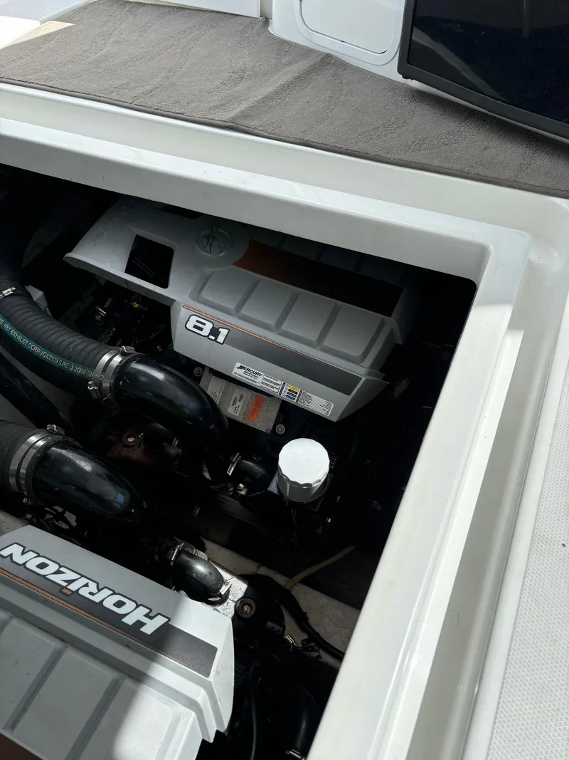 Slide: The Image of 2011 Cruisers Yachts 330 Express engine compartment with Horizon 8.1 engine. - 31
