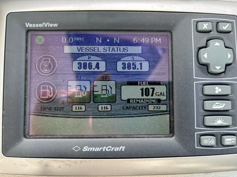 Slide: The Image of SmartCraft VesselView display on 2011 Cruisers Yachts 330 Express, showing fuel status and engine data. - 7