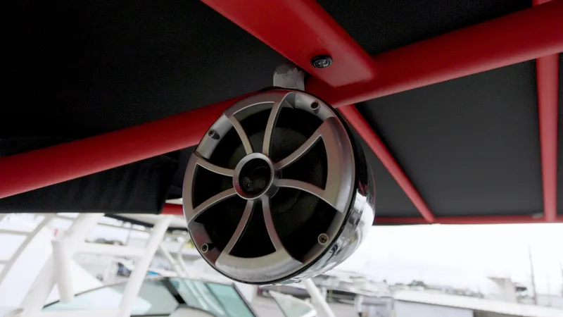 Slide: The Image of Close-up of a speaker on a 2018 Yamaha Boats 242 XE. - 13