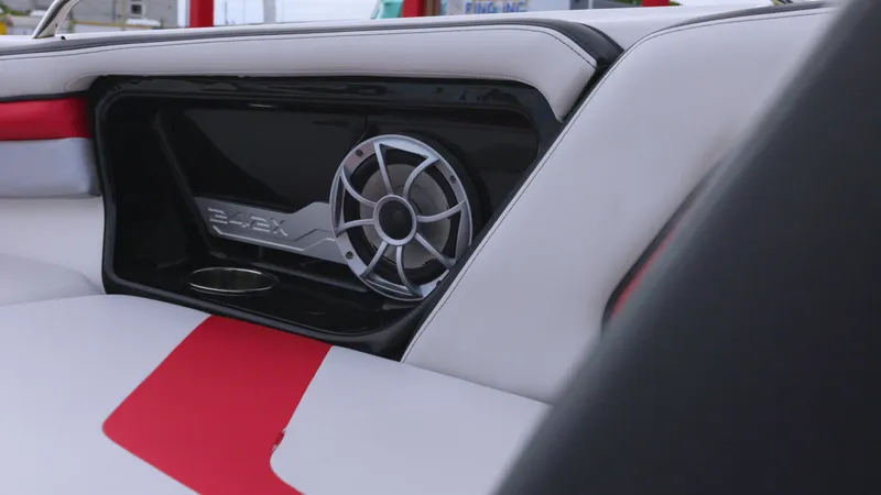 Slide: The Image of 2018 Yamaha Boats 242 XE interior with speaker and red accents. - 4