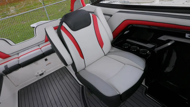 Slide: The Image of 2018 Yamaha Boats 242 XE interior with red and white seating. - 5