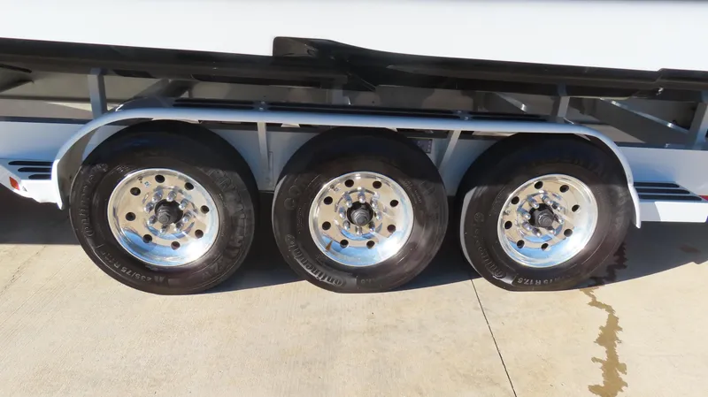 Slide: The Image of Triple axle trailer with shiny chrome wheels, MTI 48 model, 2020. - 10