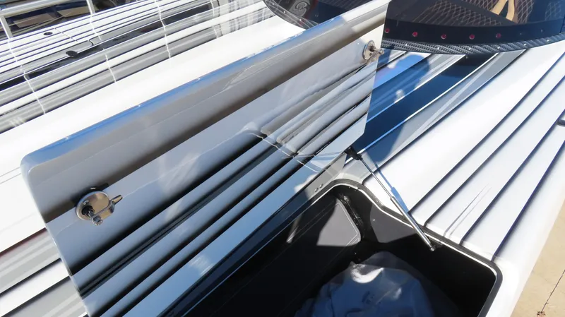Slide: The Image of Close-up of MTI 48 boat detail, showcasing sleek design and reflective surfaces, 2020 model. - 12