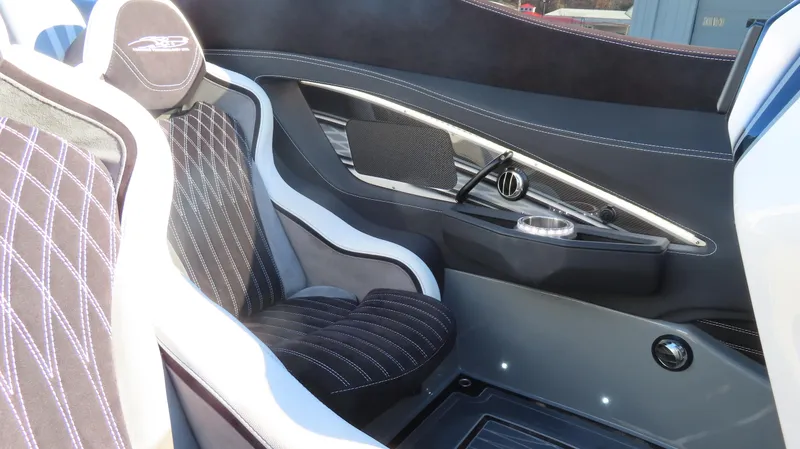 Slide: The Image of Luxurious interior of a 2020 MTI 48 boat with sleek seating and modern design. - 25