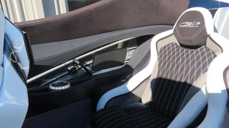 Slide: The Image of Luxurious interior of a 2020 MTI 48 boat with sleek seating and modern design. - 26