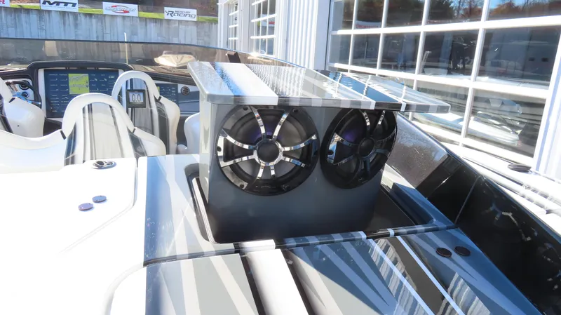 Slide: The Image of 2020 MTI 48 boat interior with dual speakers and sleek design. - 27