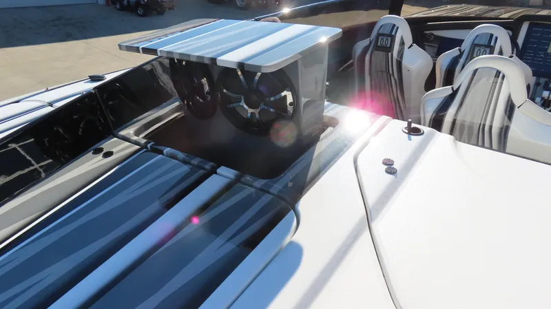 Slide: The Image of 2020 MTI 48 boat interior with sleek design and modern seating. - 28