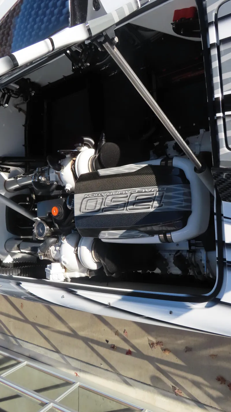 Slide: The Image of 2020 MTI 48 boat engine compartment with visible components and detailing. - 36