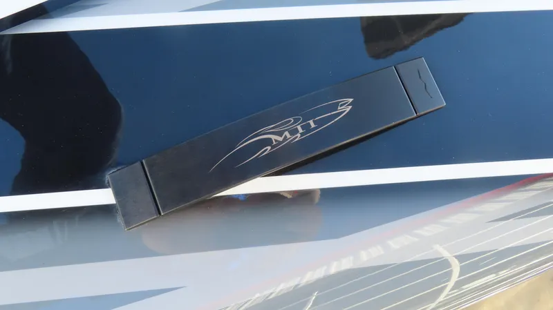 Slide: The Image of MTI 48 2020 model boat detail with sleek design and logo. - 40