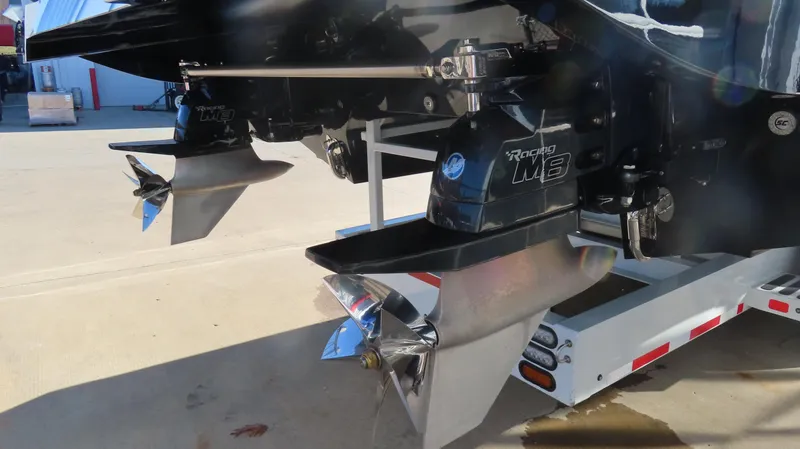 Slide: The Image of MTI 48 boat with Mercury Racing M8 drives, 2020 model, on a trailer. - 6