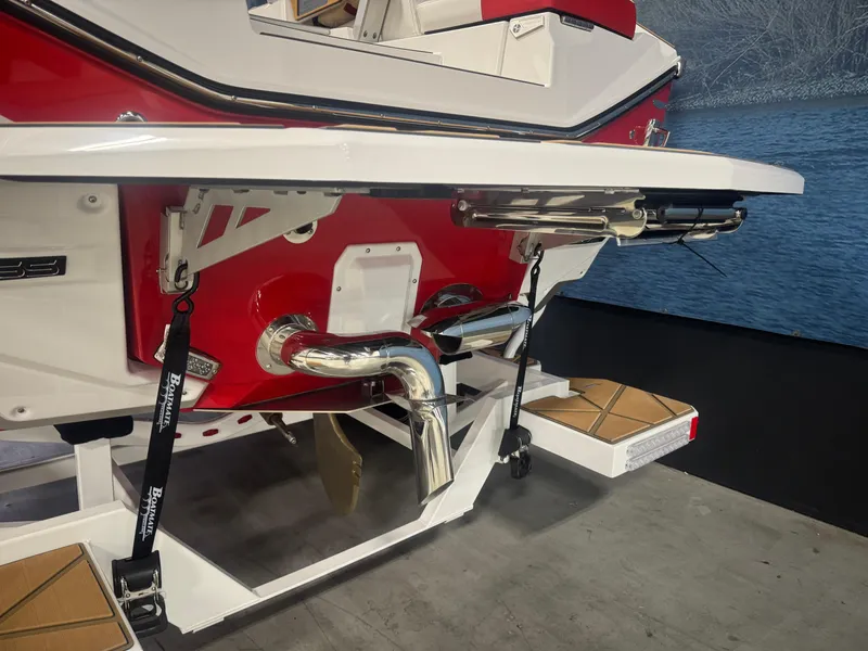 Slide: The Image of 2025 Nautique Super Air Nautique G23 Paragon boat rear view, showcasing sleek design and features. - 6