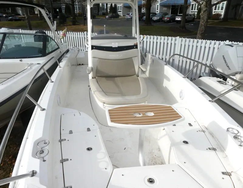 Slide: The Image of 2019 Boston Whaler 270 Dauntless boat interior with seating and deck features. - 8