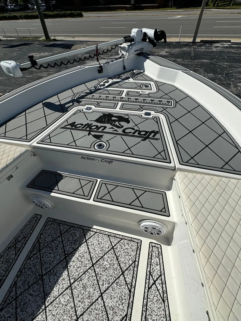 Slide: The Image of 2017 Action Craft 24 A.C.E. boat deck with custom design and logo. - 4