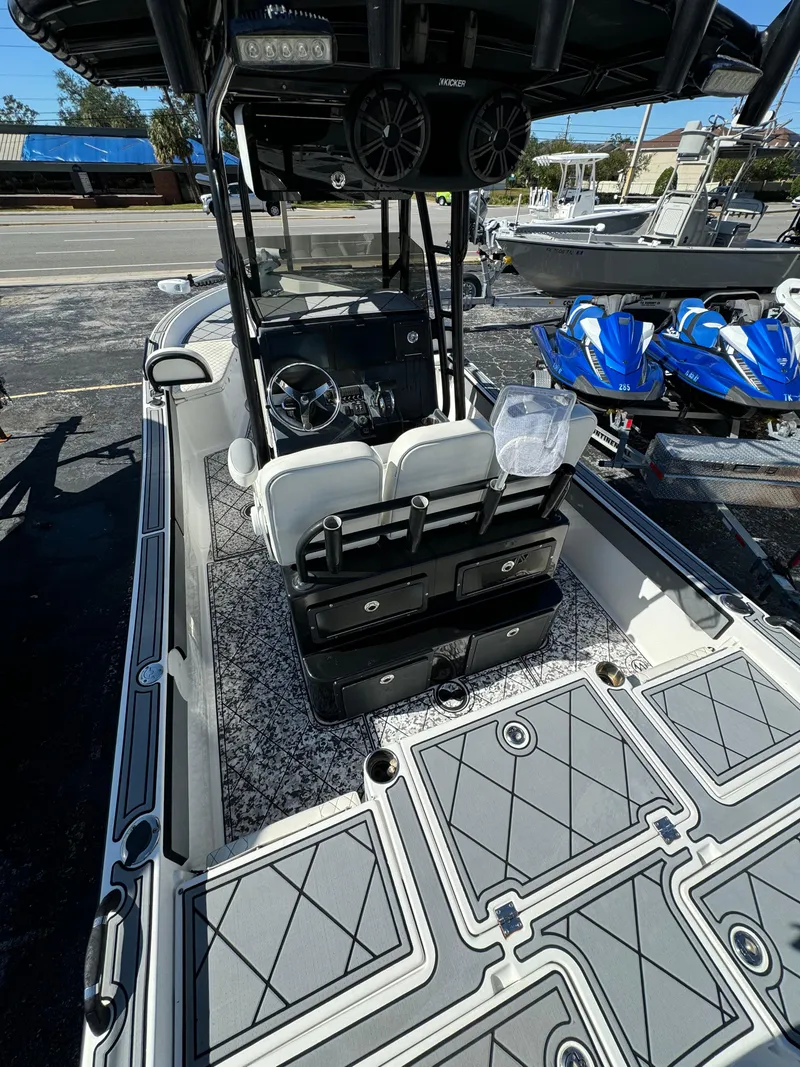 Slide: The Image of 2017 Action Craft 24 A.C.E. boat interior with modern seating and sleek design. - 5