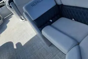 Slide: The Image of Nepallo 20QL 2022 boat interior with gray seating and stylish design. - 13